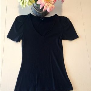 Black fitted v-neck ribbed top. Thick material!